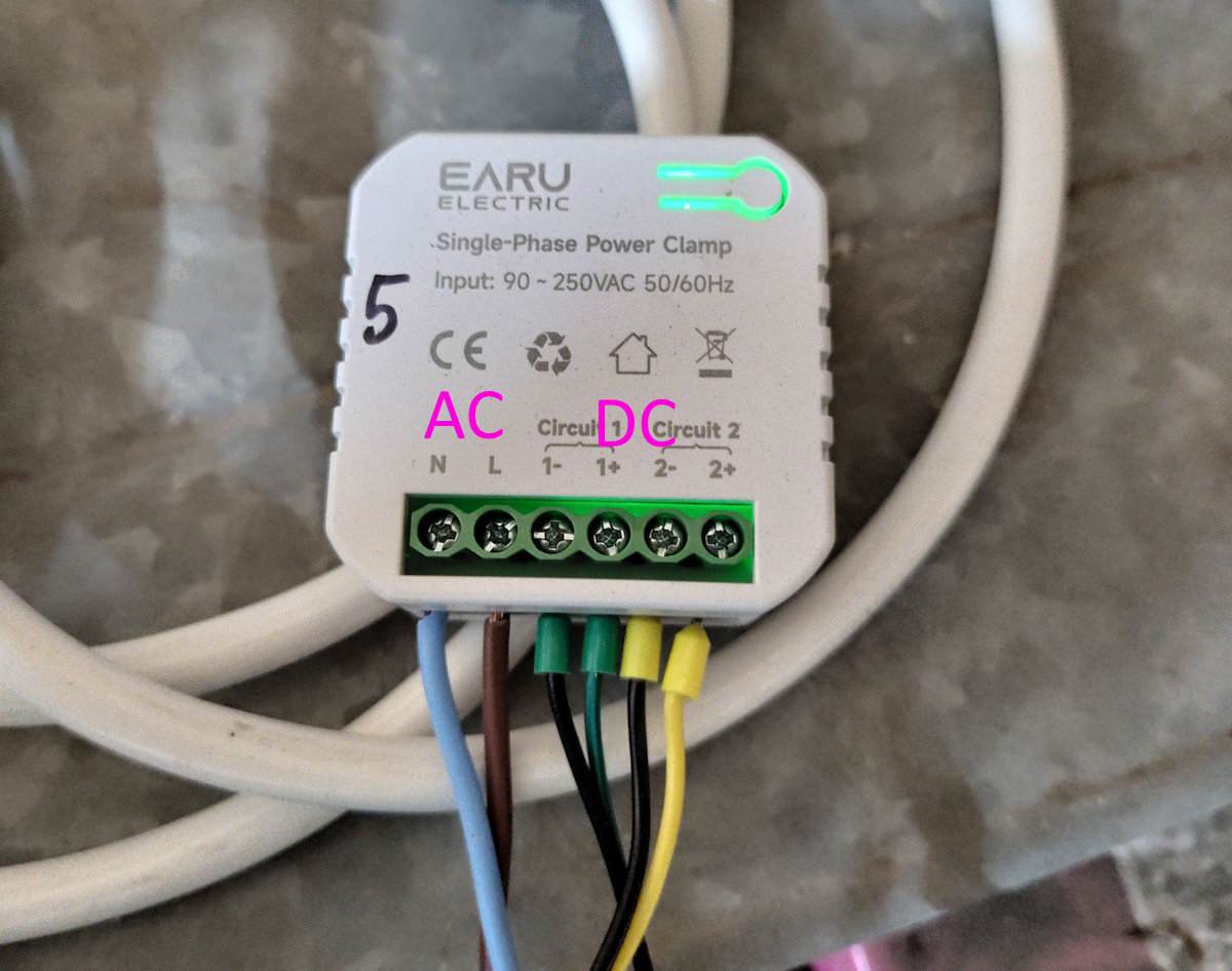 Clamp meter. Input on left is AC for voltage. Inputs on right are DC for clamps.